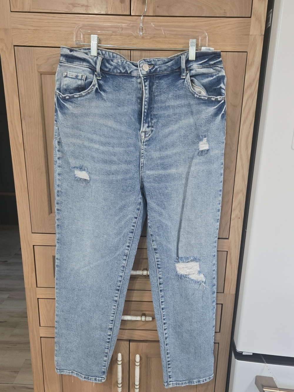 Light Blue Straight Leg Women’s Jeans with Distressed Detail